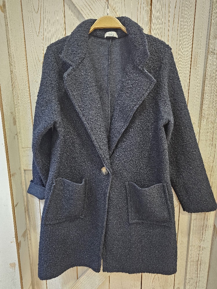 ABRIGO RIZO BOLSILLOS